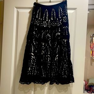 Beautiful embroidered skirt with white slip underneath. Size 4 never worn